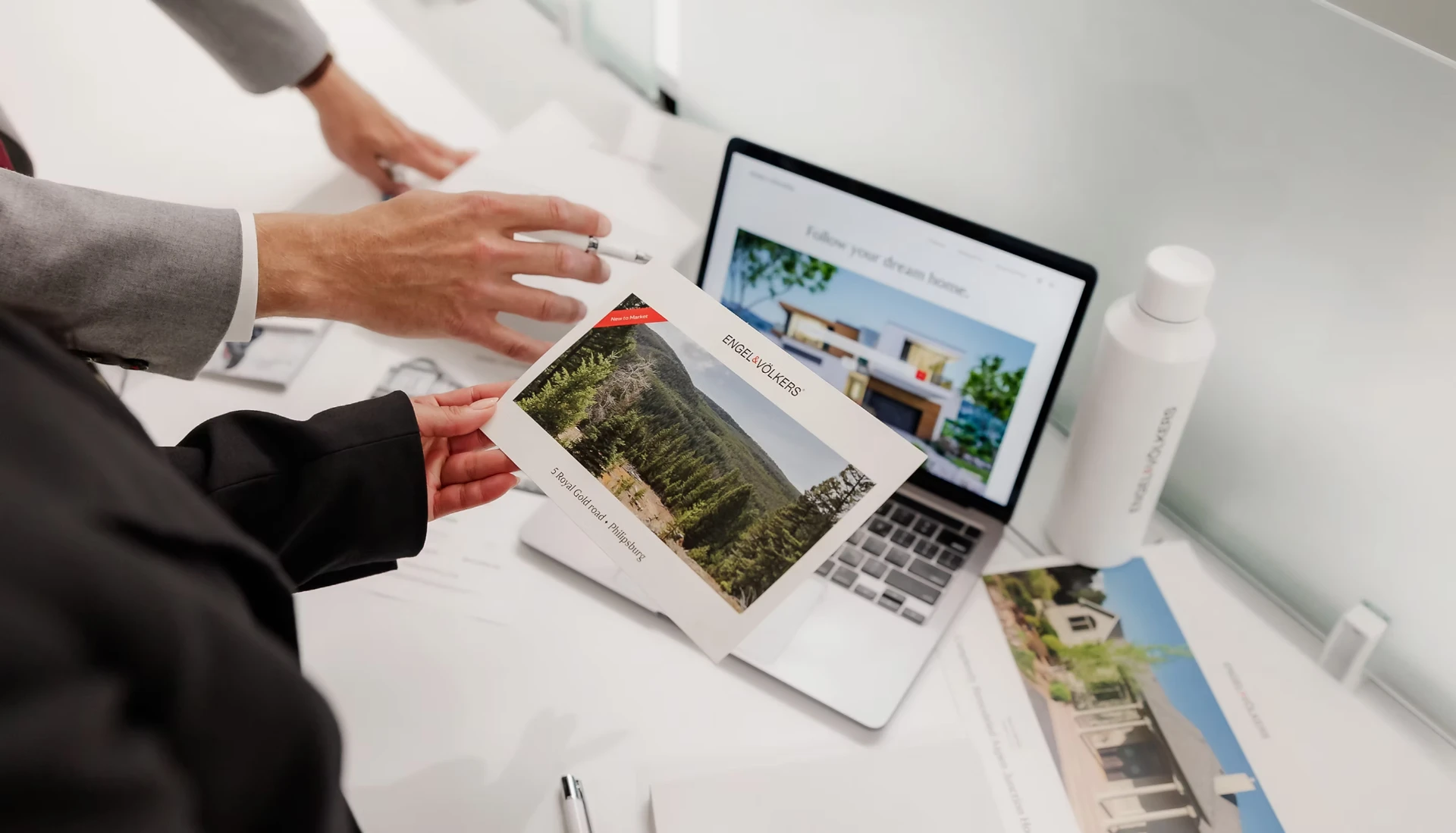 Engel & Völkers advisors collaborating on a luxury listing campaign